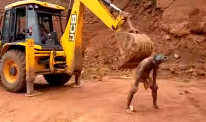 man uses excavator to scratch his back video goes viral