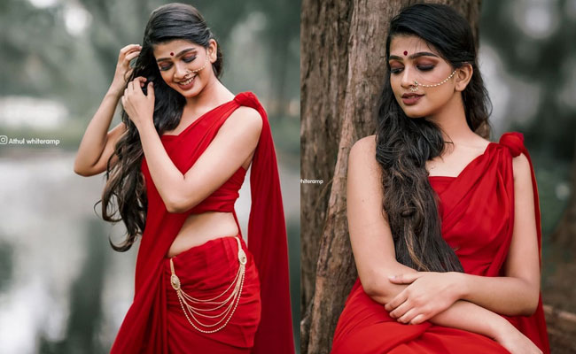 𝗔𝗻𝗮𝗻𝘁𝗵𝗶𝗸𝗮 Hot looks In a Red Saree